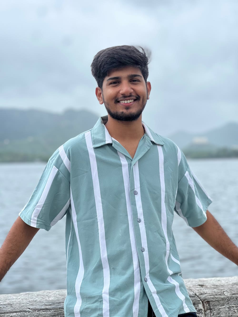 Sachin Patidar in a mint striped shirt